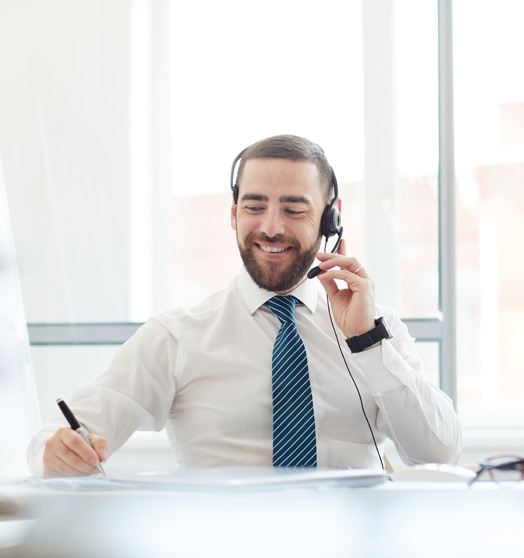 Man smiling wearing a headset