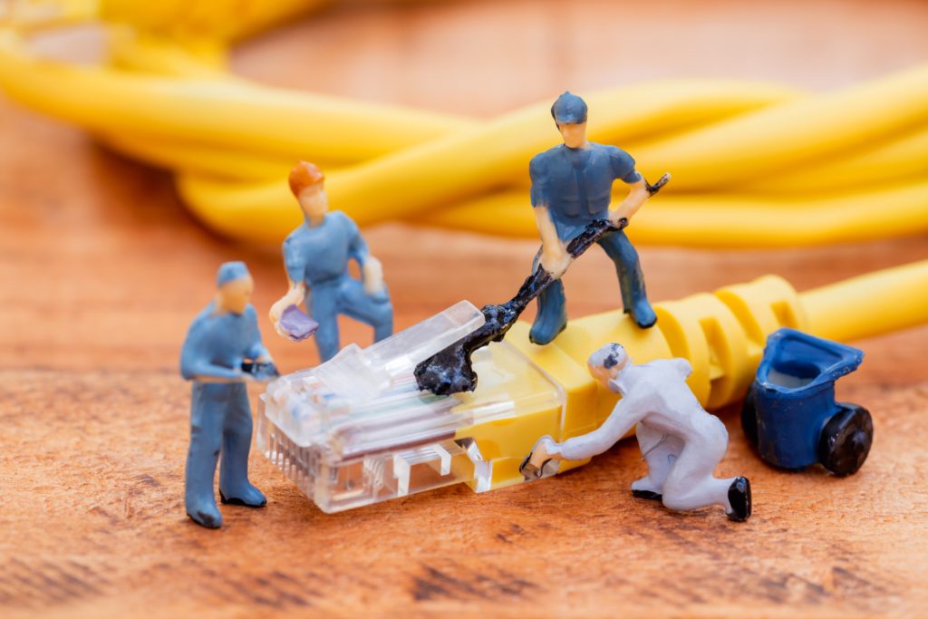 Telecoms workers helping with FTTP Connection